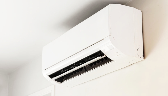 What should I do if my evaporator coils are frozen?